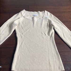 gold sweater